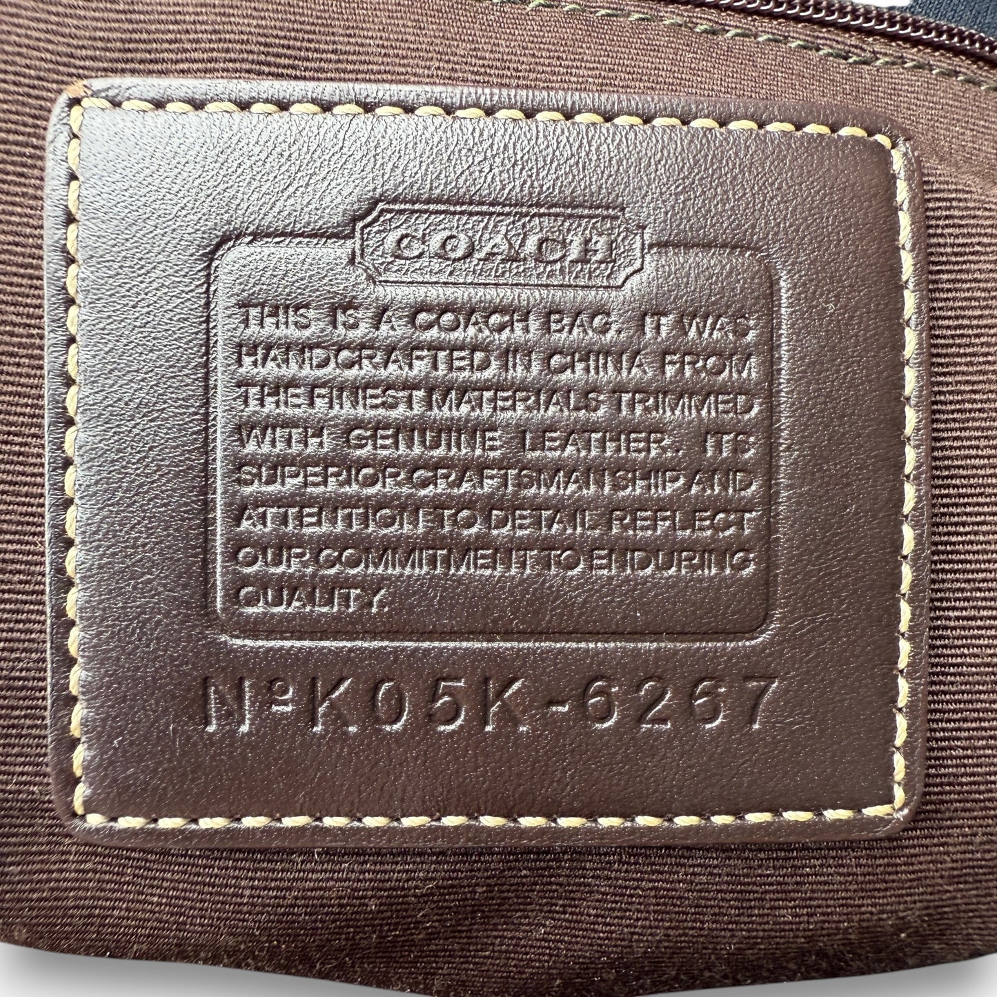 COACH SIGNATURE BRAIDED HOBO BAG